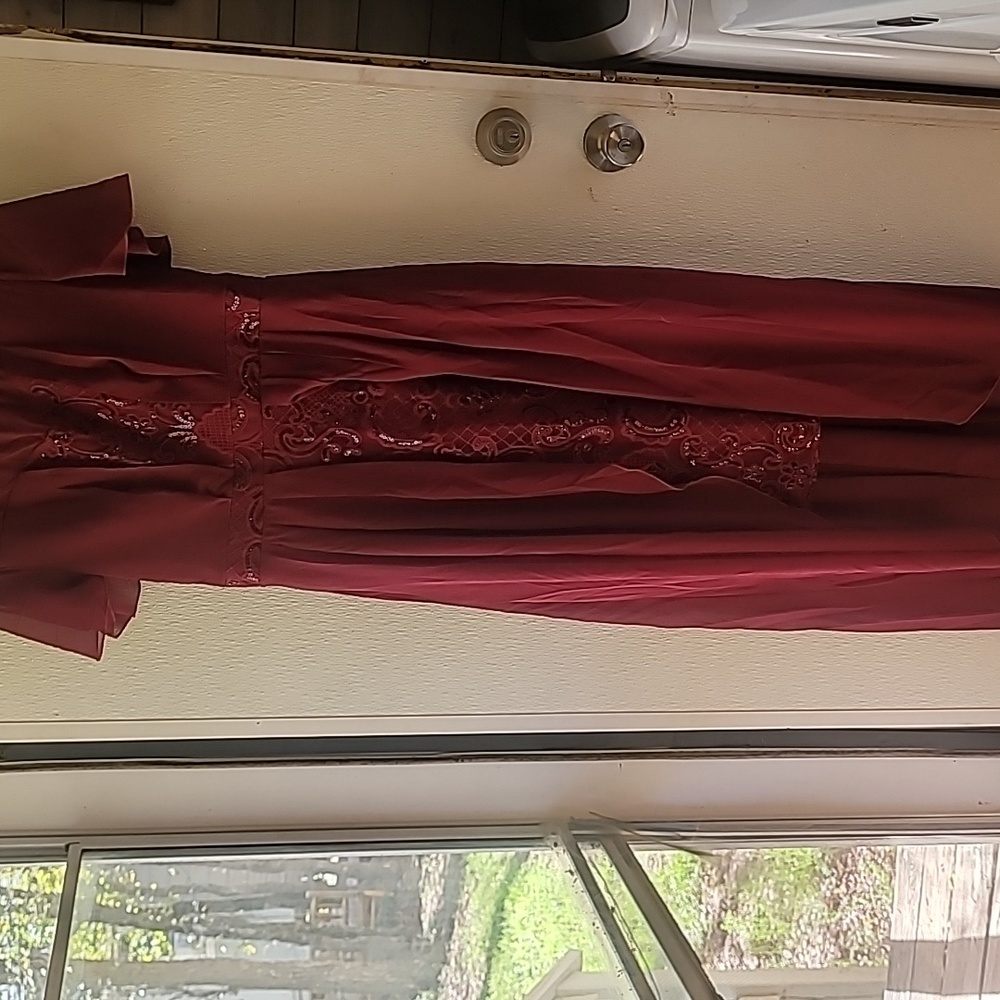 Beautiful woman's burgandy dress size medium.